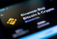 Close-up of the Binance app interface displaying Bitcoin and cryptocurrency options