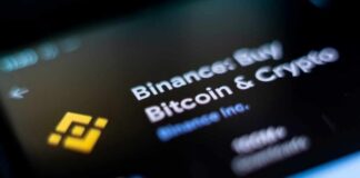 Close-up of the Binance app interface displaying Bitcoin and cryptocurrency options