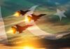 Three fighter jets fly in formation over a sunset sky with a flag overlay