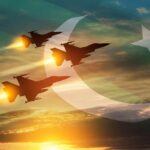 Three fighter jets fly in formation over a sunset sky with a flag overlay