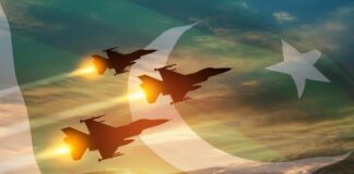 Three fighter jets fly in formation over a sunset sky with a flag overlay