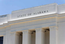 Alabama’s Map Slammed as ‘Intentionally Discriminatory’ Facade of a government building with the words 'STATE OF ALABAMA' displayed prominently