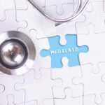 47,000% Medicaid EXPLOSION – Auditor Suspects FRAUD A stethoscope next to a puzzle piece labeled 'Medicaid'