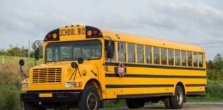 A yellow school bus parked on a road