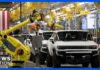 Robots Roll In After Mass Layoffs GM lays off 1,000 workers and adds robots to its assembly line