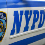 Crime Wave Clashes With Anti-Cop Chorus Close-up of a New York Police Department vehicle with badge and NYPD lettering