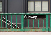 “Jews Are Eating Kids”: Nurse Attacked on Subway Subway entrance with a green railing and a sign reading Subway