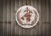 Ebola Outbreak Grows in Central Africa, WHO Tracks Cross-Border Risk World Health Organization emblem featuring a globe and caduceus