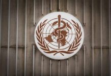 Ebola Outbreak Grows in Central Africa, WHO Tracks Cross-Border Risk World Health Organization emblem featuring a globe and caduceus