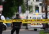 Deadly Crash Exposes NYC’s Scooter Law Mess Police officers near a crime scene marked by caution tape