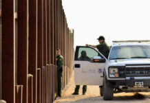 Border Chaos: Packed Rig Blows Past Checkpoint U.S. Customs and Border Protection officers near a border fence