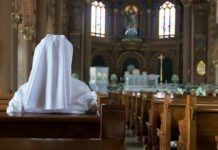 Aid-In-Dying Backfires: Nuns Rebel Person in white habit seated in a church pew facing the altar