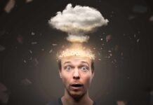Surprised man with exploding head concept and cloud above