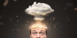 Surprised man with exploding head concept and cloud above