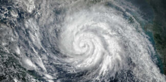 Satellite image of a hurricane swirling over the ocean