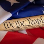 United States Constitution scroll on American flag