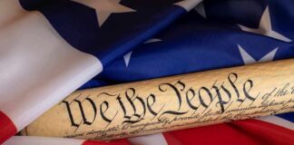 United States Constitution scroll on American flag