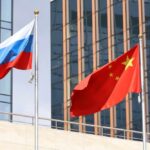 War Drills Tighten Beijing–Moscow Bond A fleet of military ships sailing in the ocean