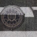 FBI seal on a granite wall