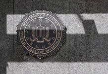 FBI seal on a granite wall