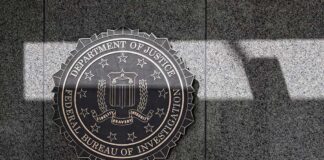 FBI seal on a granite wall