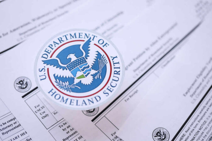 shutterstock_2441299051 Close-up of U.S. Department of Homeland Security seal on official documents