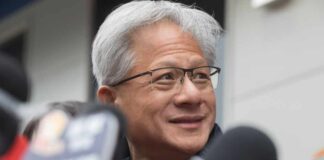 Silicon Valley Jitters: Huang Ducks The Hot Seat Close-up of a circuit board with an AI symbol and digital effects