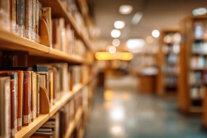 Rows,Of,Bookshelves,Filled,With,Numerous,Books,Line,A,Library A historic government building with an American flag and people walking nearby