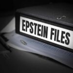 Epstein Ties Resurface — Andrew Cornered A black binder labeled 'Epstein Files' with papers and a pen beside it