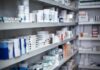 Assembly-Line Prescriptions? Judge Drops Hammer Shelves filled with various medication boxes and containers in a pharmacy
