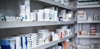 Assembly-Line Prescriptions? Judge Drops Hammer Shelves filled with various medication boxes and containers in a pharmacy