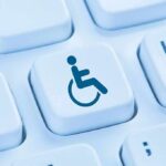 Keyboard key with wheelchair accessibility icon