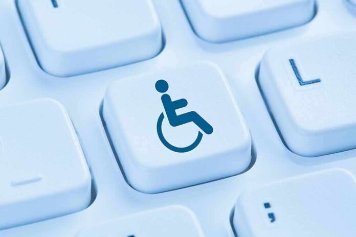 shutterstock_530331313 Keyboard key with wheelchair accessibility icon