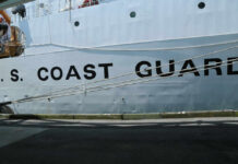 Botched Defueling Sparks Multi‑Agency Scramble Side view of a U.S. Coast Guard ship with large lettering
