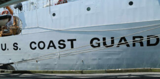 Botched Defueling Sparks Multi‑Agency Scramble Side view of a U.S. Coast Guard ship with large lettering