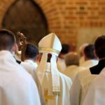 Bishops Revive Antipope Slur — Why Now? Bishop in white mitre among clergy during church procession