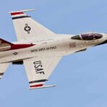 USAF fighter jet in flight against clear sky