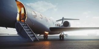 Nighttime UFO Sparks Airport Lockdown Private jet on tarmac with open door and stairs