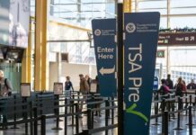 TSA PreCheck sign at airport security