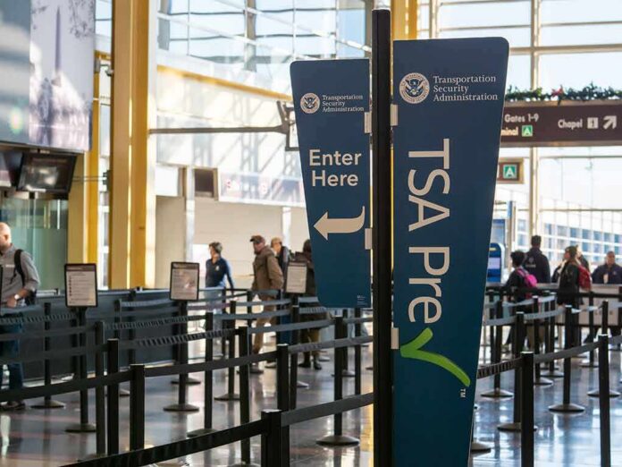 TSA PreCheck sign at airport security