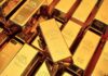 Gold bars stacked closely together