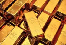 Gold bars stacked closely together