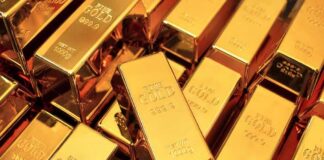 Gold bars stacked closely together