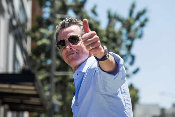 man in sunglasses giving a thumbs-up outdoors