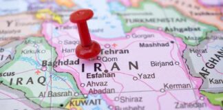 Red pushpin on a map of Iran