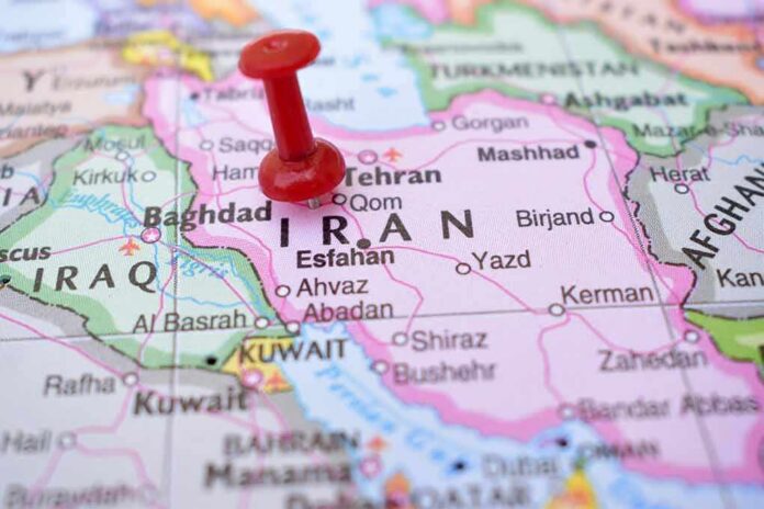 Red pushpin on a map of Iran