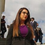 Disturbing Allegations Rock Boebert Household Woman in business attire walking outdoors