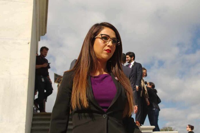 shutterstock_2370474849 Woman in business attire walking outdoors