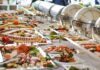 Buffet table with assorted seafood and salads