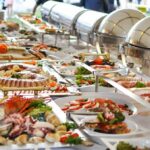 Buffet table with assorted seafood and salads